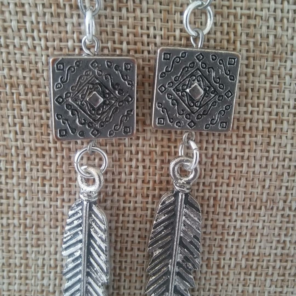 Silver Feather - Picture 2 of 2